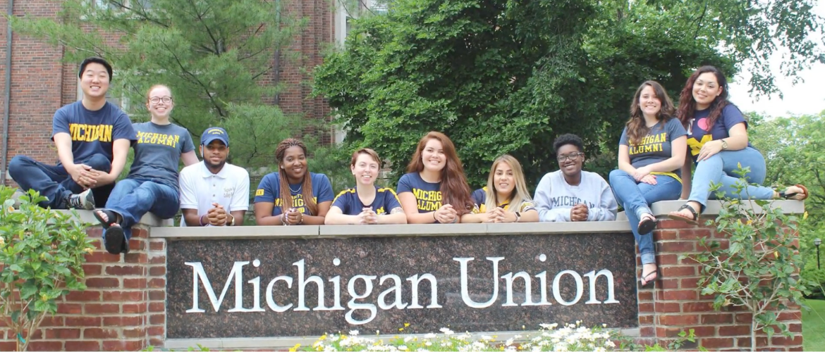 UMich Advisors in front of Michigan Union sign